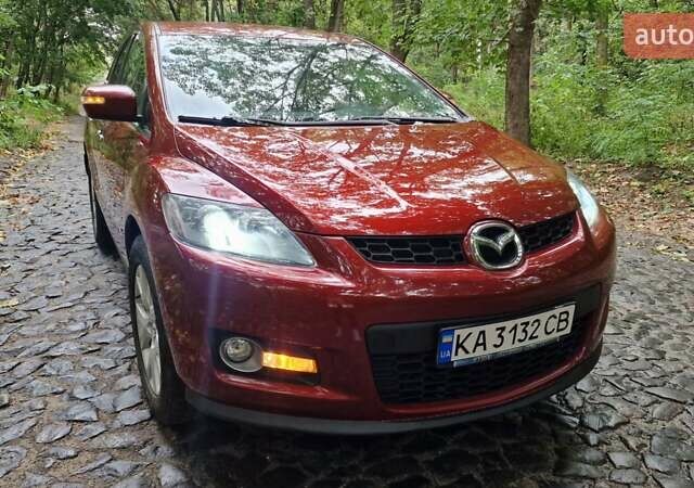 Красный Мазда СХ-7, объемом двигателя 2.26 л и пробегом 74 тыс. км за 7900 $, фото 1 на Automoto.ua