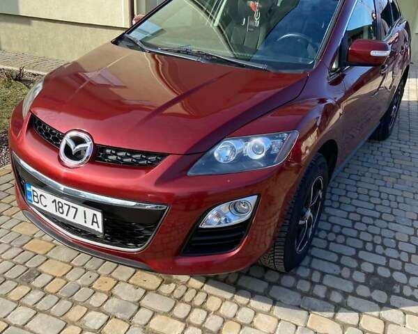 Красный Мазда СХ-7, объемом двигателя 2.2 л и пробегом 220 тыс. км за 8200 $, фото 1 на Automoto.ua
