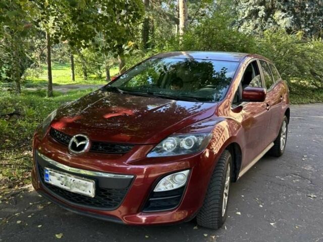 Красный Мазда СХ-7, объемом двигателя 2.5 л и пробегом 200 тыс. км за 10496 $, фото 1 на Automoto.ua