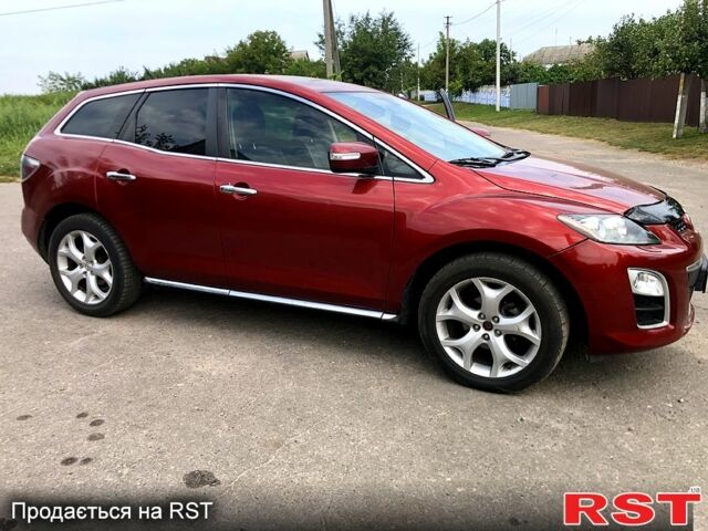 Красный Мазда СХ-7, объемом двигателя 2.3 л и пробегом 152 тыс. км за 8000 $, фото 1 на Automoto.ua