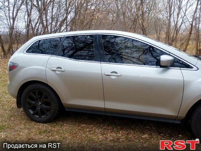 Серый Мазда СХ-7, объемом двигателя 2.3 л и пробегом 132 тыс. км за 7500 $, фото 1 на Automoto.ua