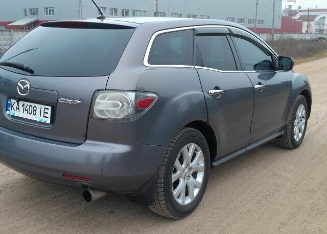 Сірий Мазда СХ-7, об'ємом двигуна 2.3 л та пробігом 235 тис. км за 6600 $, фото 1 на Automoto.ua