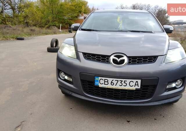 Серый Мазда СХ-7, объемом двигателя 2.26 л и пробегом 215 тыс. км за 7000 $, фото 1 на Automoto.ua