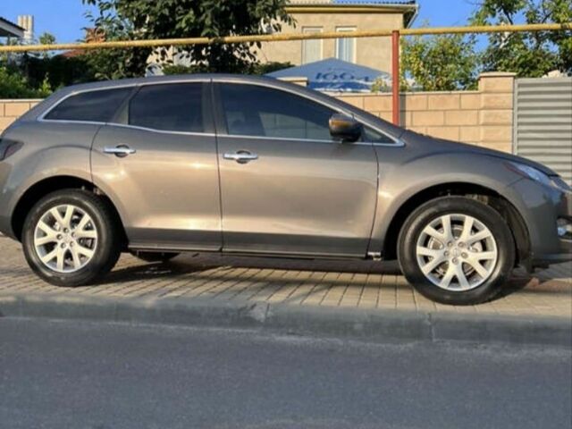 Серый Мазда СХ-7, объемом двигателя 2 л и пробегом 220 тыс. км за 7800 $, фото 1 на Automoto.ua