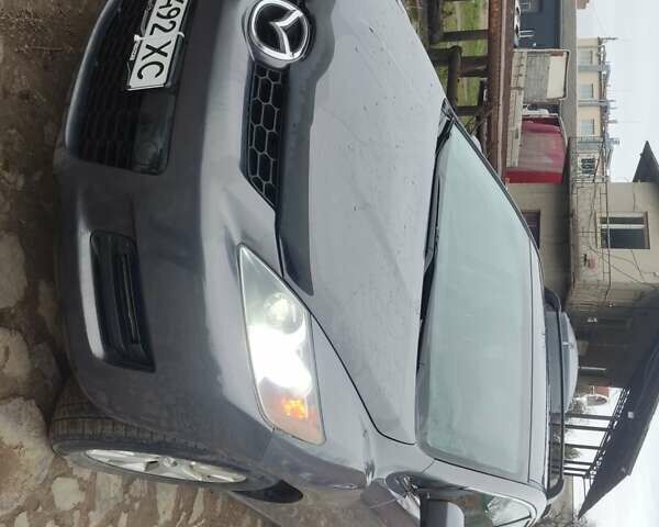 Серый Мазда СХ-7, объемом двигателя 2.3 л и пробегом 230 тыс. км за 7777 $, фото 1 на Automoto.ua