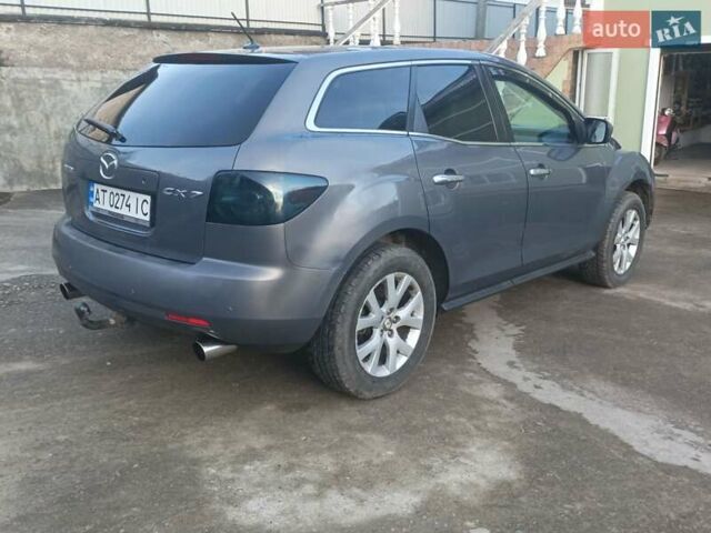 Серый Мазда СХ-7, объемом двигателя 2.26 л и пробегом 240 тыс. км за 5800 $, фото 1 на Automoto.ua