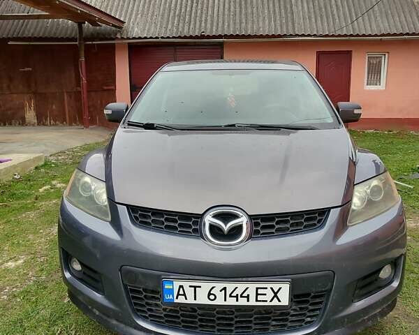 Серый Мазда СХ-7, объемом двигателя 2.3 л и пробегом 190 тыс. км за 7500 $, фото 1 на Automoto.ua