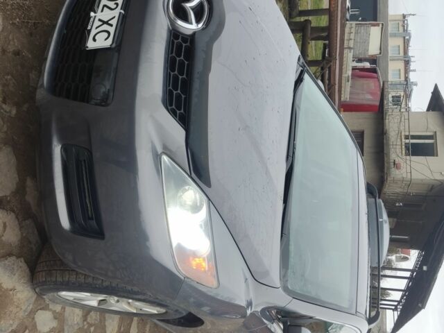 Серый Мазда СХ-7, объемом двигателя 2.3 л и пробегом 235 тыс. км за 7777 $, фото 1 на Automoto.ua