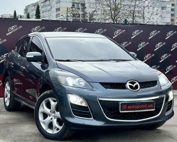 Серый Мазда СХ-7, объемом двигателя 2.18 л и пробегом 196 тыс. км за 9700 $, фото 1 на Automoto.ua