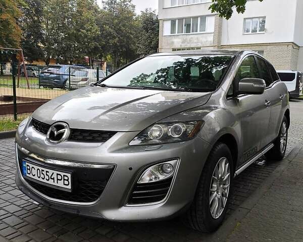 Серый Мазда СХ-7, объемом двигателя 2.18 л и пробегом 256 тыс. км за 7800 $, фото 1 на Automoto.ua