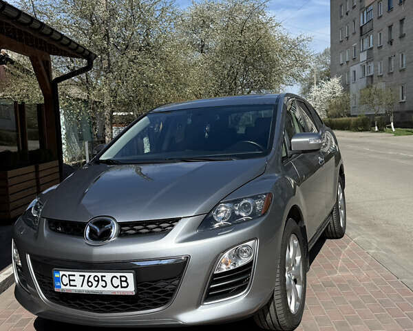 Серый Мазда СХ-7, объемом двигателя 2.2 л и пробегом 224 тыс. км за 10800 $, фото 1 на Automoto.ua