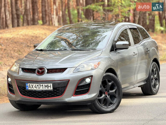 Серый Мазда СХ-7, объемом двигателя 2.26 л и пробегом 175 тыс. км за 7800 $, фото 1 на Automoto.ua