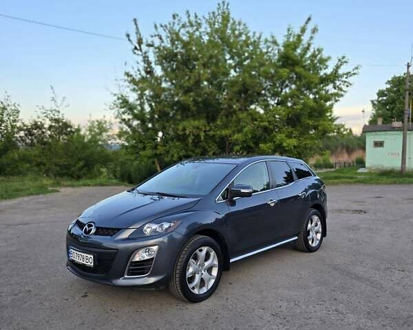 Сірий Мазда СХ-7, об'ємом двигуна 2.18 л та пробігом 259 тис. км за 10499 $, фото 1 на Automoto.ua