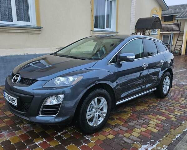 Серый Мазда СХ-7, объемом двигателя 2.18 л и пробегом 258 тыс. км за 10799 $, фото 1 на Automoto.ua