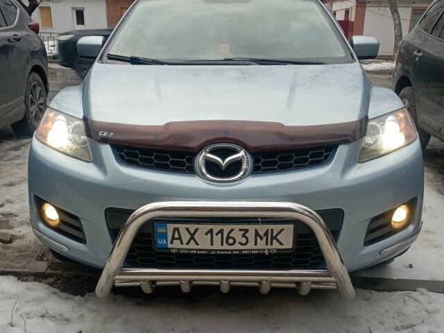 Синий Мазда СХ-7, объемом двигателя 2.3 л и пробегом 168 тыс. км за 6500 $, фото 1 на Automoto.ua