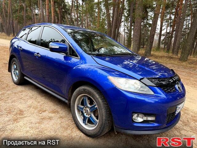 Синий Мазда СХ-7, объемом двигателя 2.3 л и пробегом 225 тыс. км за 5950 $, фото 1 на Automoto.ua