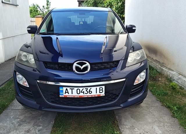 Синий Мазда СХ-7, объемом двигателя 2.2 л и пробегом 275 тыс. км за 8500 $, фото 1 на Automoto.ua