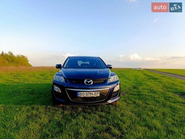 Синий Мазда СХ-7, объемом двигателя 2.18 л и пробегом 148 тыс. км за 11300 $, фото 1 на Automoto.ua