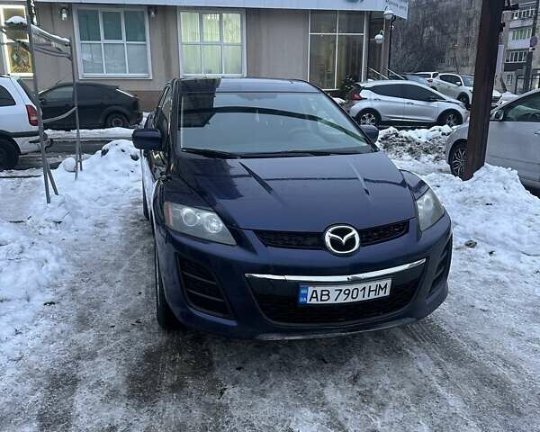 Синий Мазда СХ-7, объемом двигателя 2.49 л и пробегом 240 тыс. км за 6500 $, фото 1 на Automoto.ua