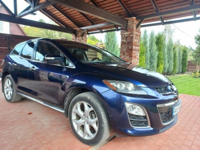 Синій Мазда СХ-7, об'ємом двигуна 2.3 л та пробігом 134 тис. км за 10900 $, фото 1 на Automoto.ua