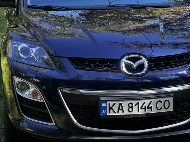 Синий Мазда СХ-7, объемом двигателя 2.3 л и пробегом 135 тыс. км за 12700 $, фото 1 на Automoto.ua