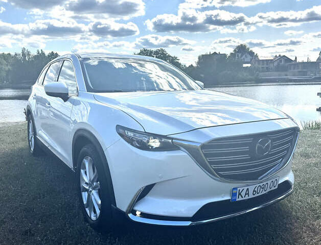 Белый Мазда СХ-9, объемом двигателя 2.49 л и пробегом 170 тыс. км за 18500 $, фото 1 на Automoto.ua