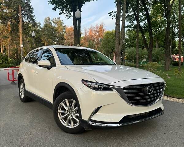 Белый Мазда СХ-9, объемом двигателя 2.49 л и пробегом 175 тыс. км за 17500 $, фото 1 на Automoto.ua