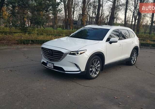 Білий Мазда СХ-9, об'ємом двигуна 2.49 л та пробігом 104 тис. км за 32000 $, фото 1 на Automoto.ua