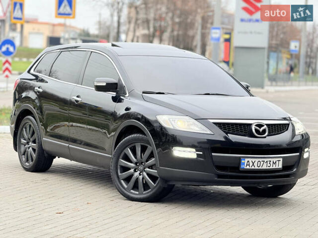 Черный Мазда СХ-9, объемом двигателя 3.5 л и пробегом 242 тыс. км за 7850 $, фото 1 на Automoto.ua