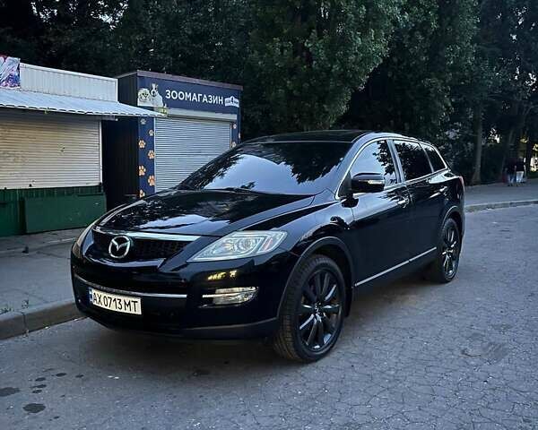 Черный Мазда СХ-9, объемом двигателя 3.5 л и пробегом 242 тыс. км за 8500 $, фото 1 на Automoto.ua