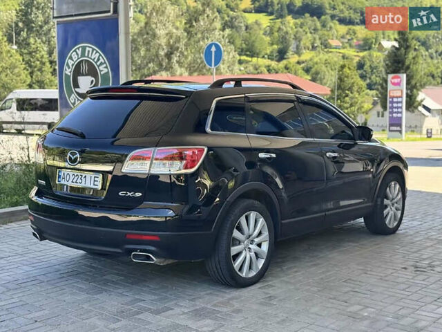 Черный Мазда СХ-9, объемом двигателя 3.73 л и пробегом 235 тыс. км за 8500 $, фото 1 на Automoto.ua