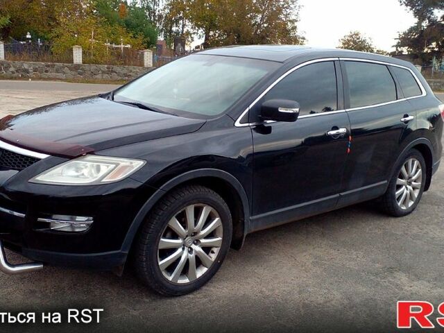 Черный Мазда СХ-9, объемом двигателя 3.7 л и пробегом 400 тыс. км за 8500 $, фото 1 на Automoto.ua
