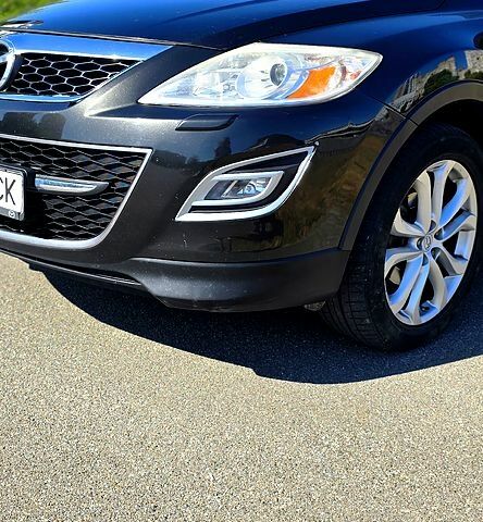 Черный Мазда СХ-9, объемом двигателя 3.7 л и пробегом 205 тыс. км за 11500 $, фото 1 на Automoto.ua