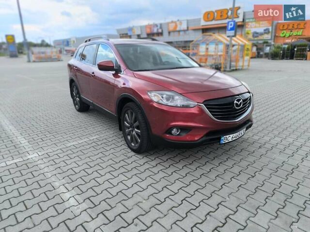Красный Мазда СХ-9, объемом двигателя 3.73 л и пробегом 140 тыс. км за 12500 $, фото 1 на Automoto.ua