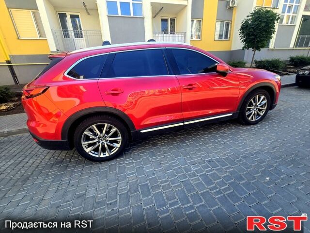 Красный Мазда СХ-9, объемом двигателя 2.5 л и пробегом 144 тыс. км за 22000 $, фото 1 на Automoto.ua