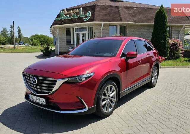 Красный Мазда СХ-9, объемом двигателя 2.5 л и пробегом 124 тыс. км за 27200 $, фото 1 на Automoto.ua