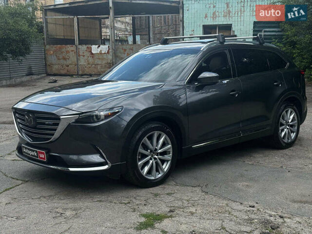 Серый Мазда СХ-9, объемом двигателя 2.5 л и пробегом 180 тыс. км за 21790 $, фото 1 на Automoto.ua