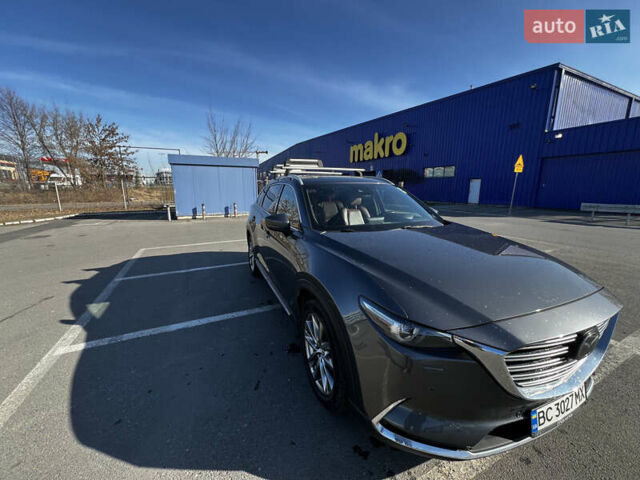 Серый Мазда СХ-9, объемом двигателя 2.49 л и пробегом 140 тыс. км за 20900 $, фото 1 на Automoto.ua