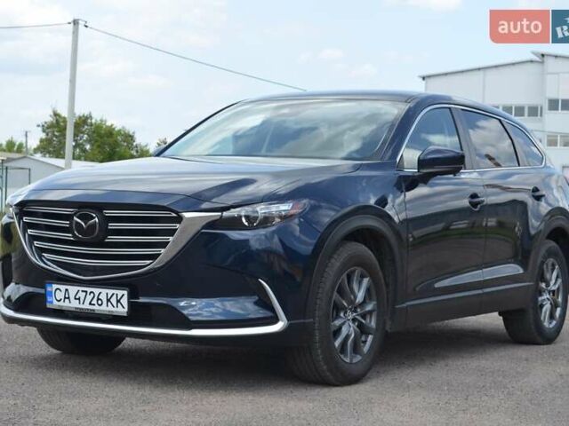 Синий Мазда СХ-9, объемом двигателя 2.49 л и пробегом 48 тыс. км за 19999 $, фото 1 на Automoto.ua