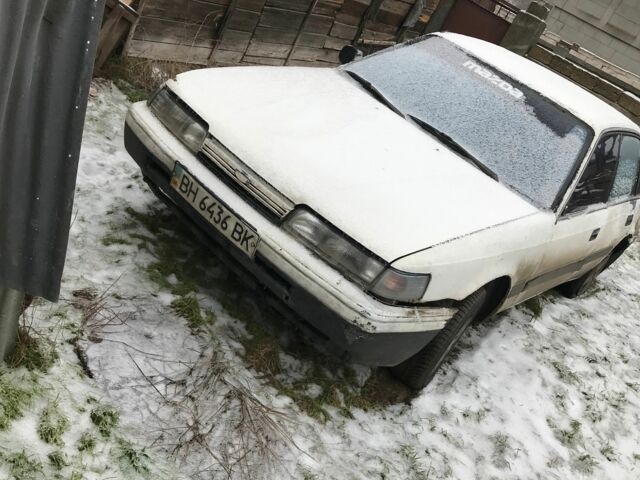 Белый Мазда Капелла, объемом двигателя 1.8 л и пробегом 2 тыс. км за 466 $, фото 1 на Automoto.ua