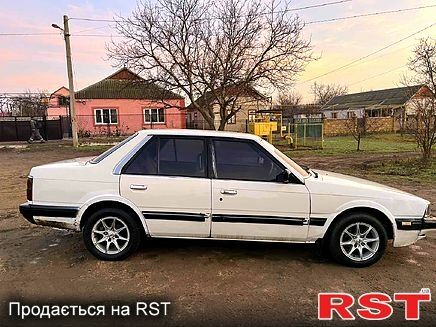 Мазда Капелла, объемом двигателя 2 л и пробегом 200 тыс. км за 700 $, фото 1 на Automoto.ua