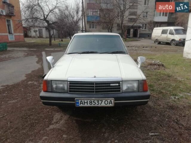 Білий Мазда Космо, об'ємом двигуна 2 л та пробігом 100 тис. км за 2500 $, фото 1 на Automoto.ua