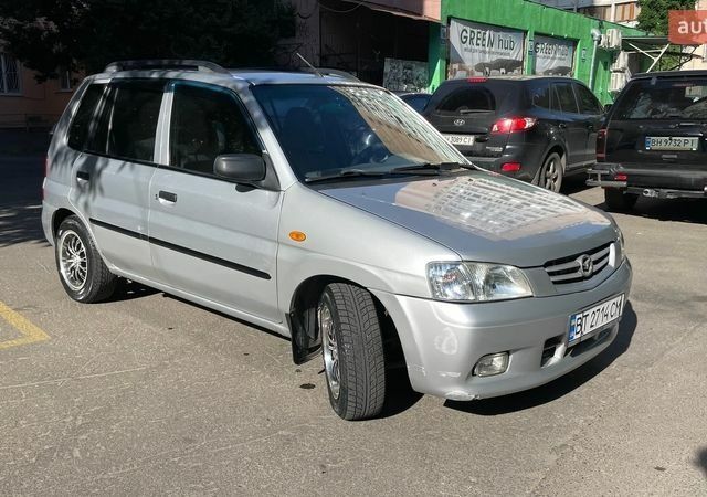 Серый Мазда Демио, объемом двигателя 1.5 л и пробегом 135 тыс. км за 3200 $, фото 1 на Automoto.ua