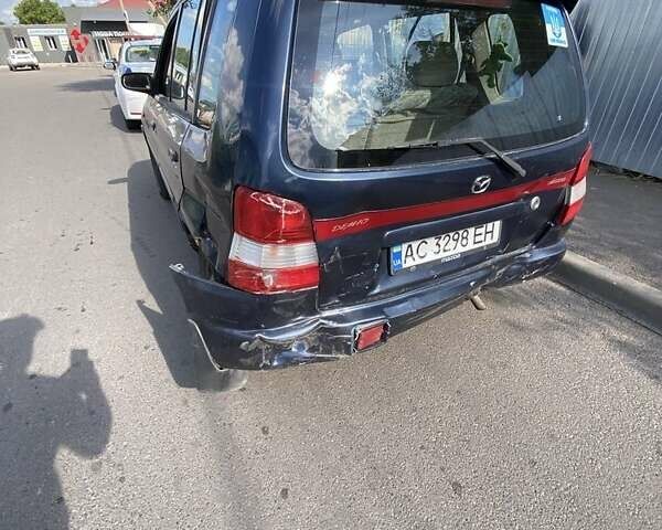 Синій Мазда Деміо, об'ємом двигуна 1.3 л та пробігом 112 тис. км за 700 $, фото 1 на Automoto.ua
