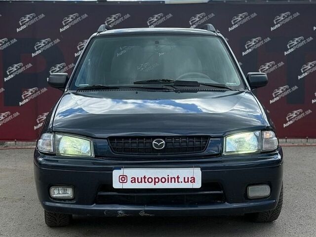 Синий Мазда Демио, объемом двигателя 1.32 л и пробегом 207 тыс. км за 1900 $, фото 1 на Automoto.ua