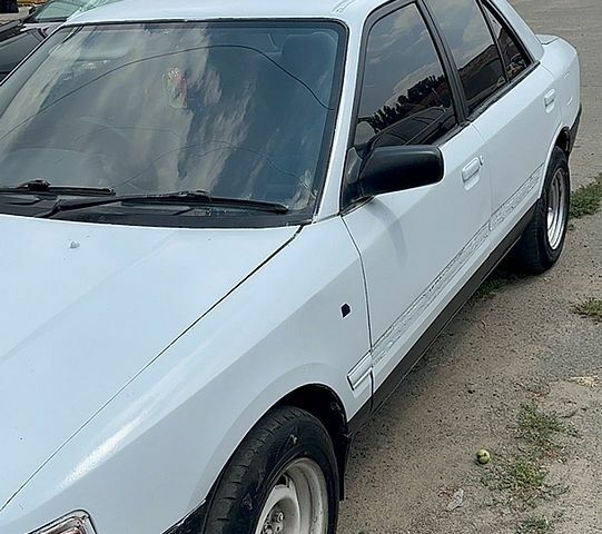 Белый Мазда Фамилия, объемом двигателя 1.5 л и пробегом 600 тыс. км за 700 $, фото 1 на Automoto.ua