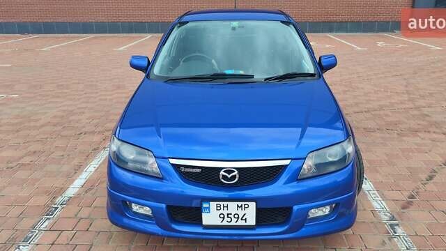 Синій Мазда Фамілія, об'ємом двигуна 1.99 л та пробігом 183 тис. км за 4800 $, фото 1 на Automoto.ua