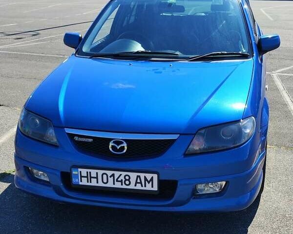 Синий Мазда Фамилия, объемом двигателя 1.99 л и пробегом 185 тыс. км за 4000 $, фото 1 на Automoto.ua