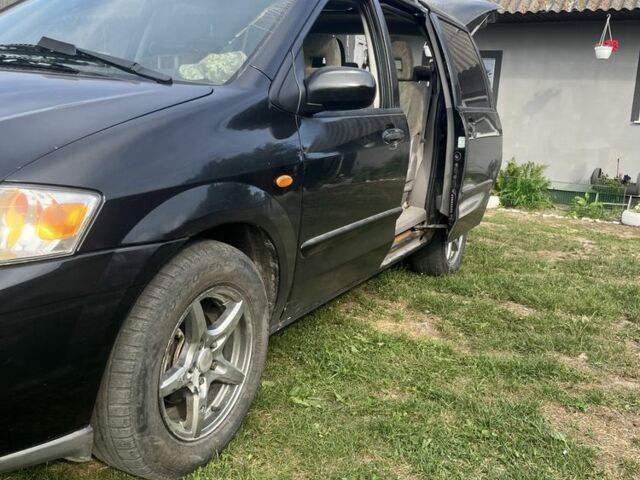 Чорний Мазда МПВ, об'ємом двигуна 2 л та пробігом 20 тис. км за 3250 $, фото 1 на Automoto.ua
