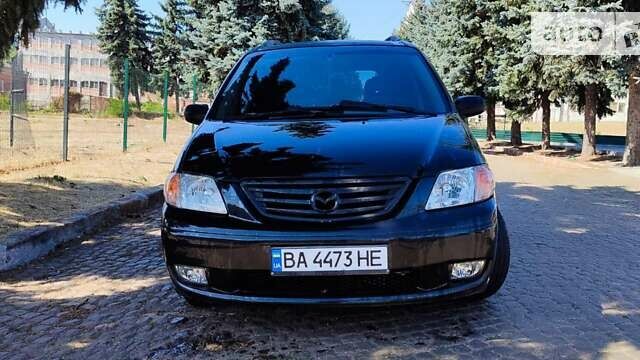 Черный Мазда МПВ, объемом двигателя 2 л и пробегом 400 тыс. км за 3600 $, фото 1 на Automoto.ua